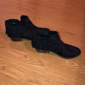 Black suede booties with fringe